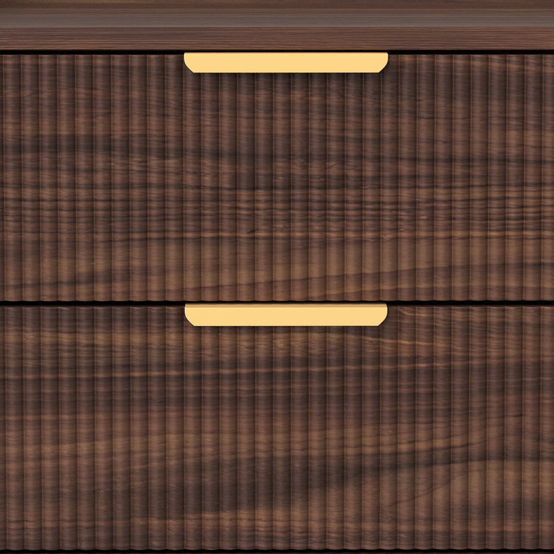 Close-up of the ridged fluted drawer texture and gold-tone pull handle