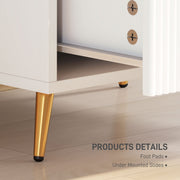 Close-up of the tapered gold metal leg, protective foot pad and under-mounted drawer slides