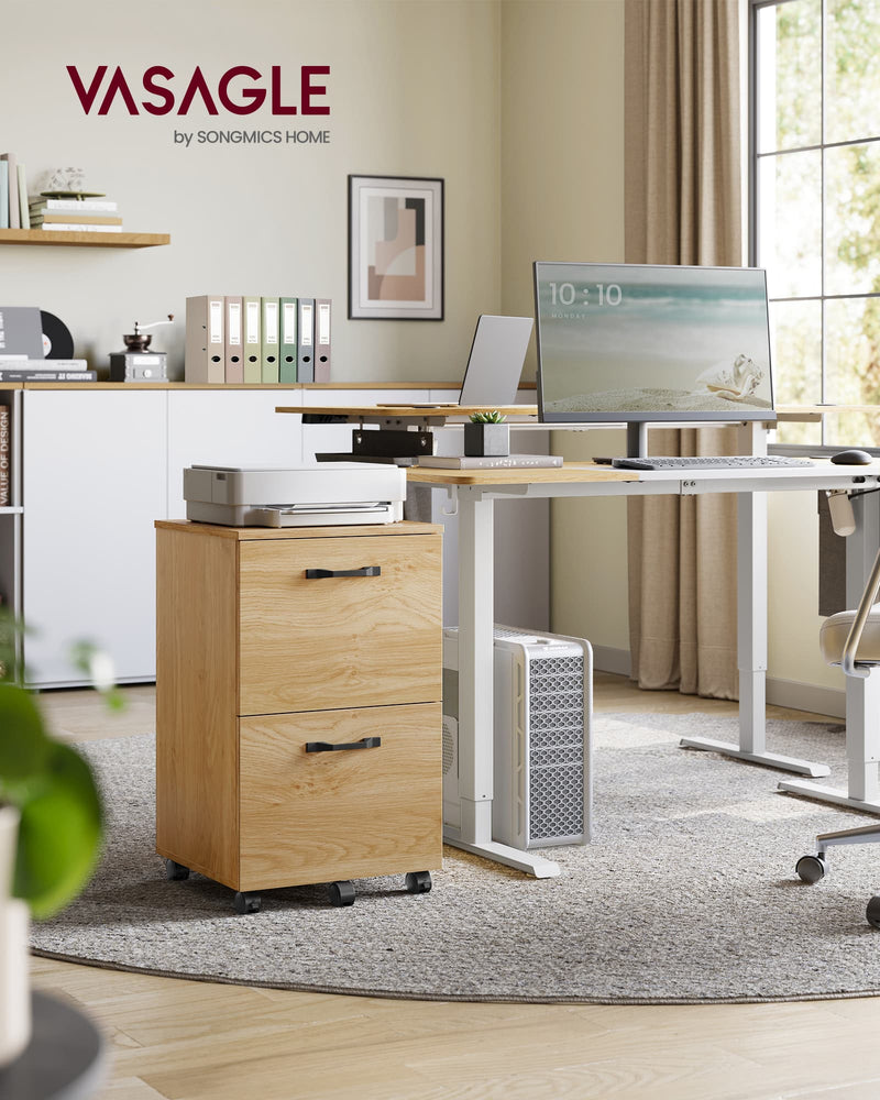 Filing cabinet beside a standing desk in a home office, Vasagle branding