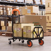 Hand truck carrying boxes through a warehouse in 4-wheel mode