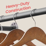 2 pack wall-mounted industrial pipe clothes rails by Songmics, styled with hanging clothes