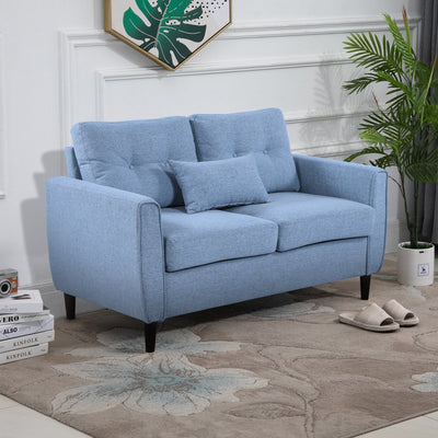 Blue tufted 2 seater fabric loveseat sofa in a modern living room