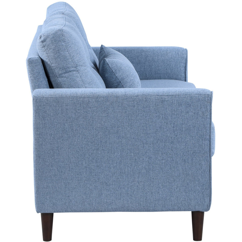 Side profile of blue tufted fabric loveseat sofa