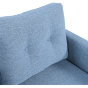 Close-up of button-tufted detail on blue backrest cushion