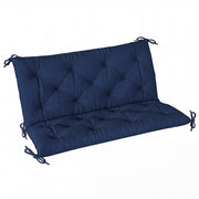Dark blue tufted two-seater bench cushion with tie fastenings, studio shot with no frame