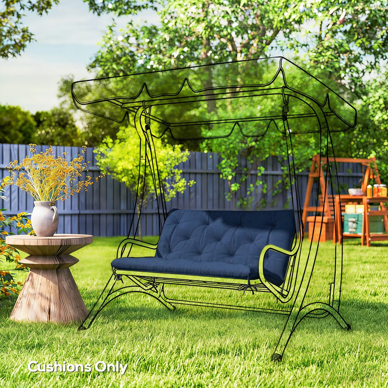 Dark blue cushion fitted on an outlined garden swing chair frame beside a table, cushions only