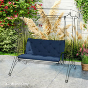Cushion fitted on an outlined swing frame on a patio surrounded by pampas grass, cushions only