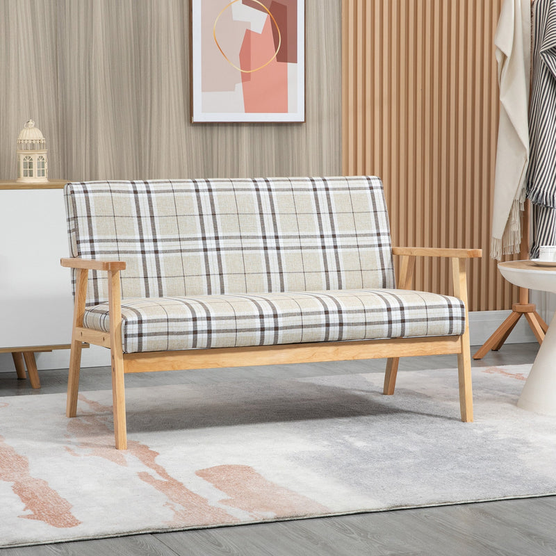 Check pattern 2 seater sofa in a living room beside a rug and wood panelling