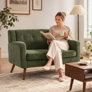 Front view of the loveseat sofa showing rubberwood legs and cushion detail