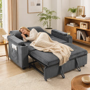 Woman sleeping on the dark grey sofa bed pulled out into bed mode with a throw blanket