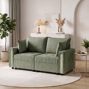 2 seater sofa in a living room with a round rug and a small side table