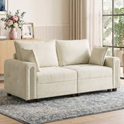 2 seater velvet loveseat in a bright living room on a patterned rug