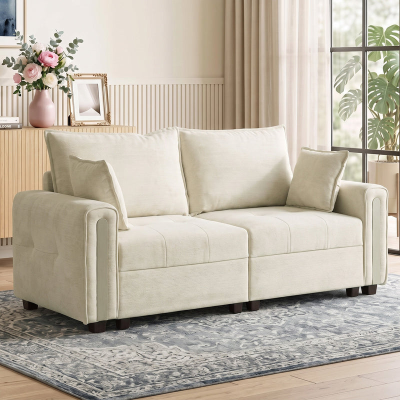 2 seater velvet loveseat in a bright living room on a patterned rug