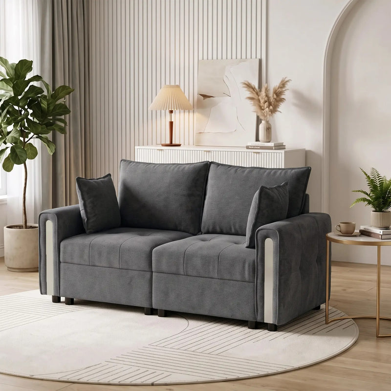 Loveseat on a round rug beside a side table, with a sideboard and table lamp behind