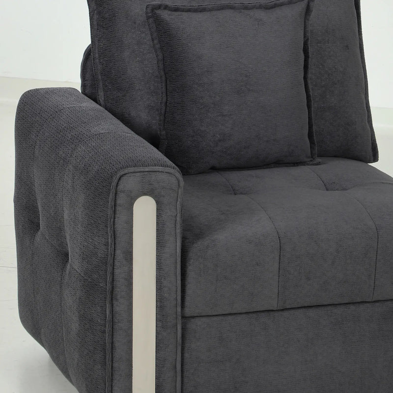 Detail of the padded armrest with its contrast trim strip and tufted seat