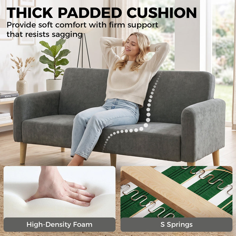 Woman relaxing on the thick padded seat cushion with high-density foam and S springs shown