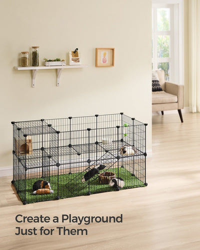 Black wire pet playpen set up on a living room floor with guinea pigs, a hay feeder and a water bottle