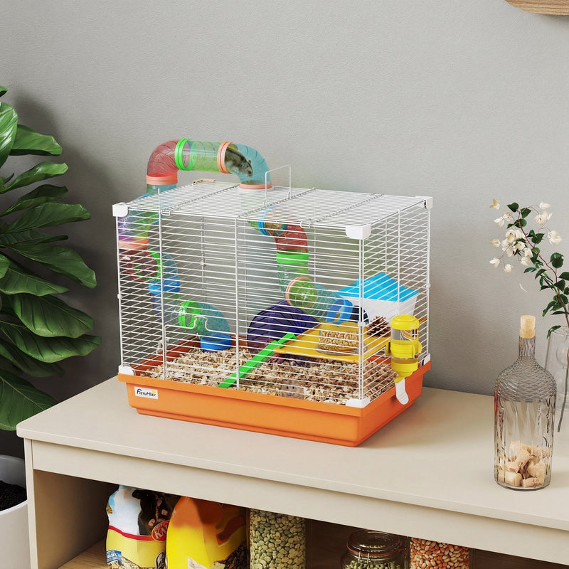 Orange and white hamster cage shown on a sideboard beside potted plants