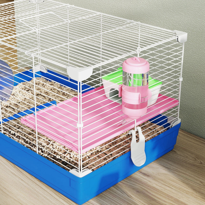 Overhead angle of the pink platform, water bottle and wheel inside the cage