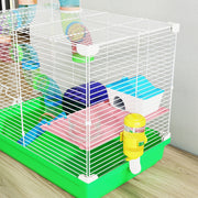Close-up angled view inside the PawHut hamster cage showing the wheel, house and ladder