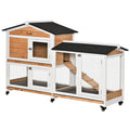 2-tier rabbit hutch in natural wood tone with white trim and black asphalt roof, on castor wheels