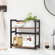 Spice rack in a bathroom with a plant, bowl, bottles and folded towels