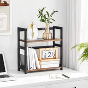 Spice rack on a desk holding a vase, books and a paper calendar