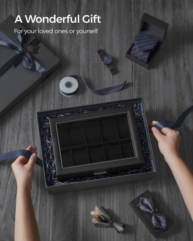 Watch box styled on a dresser with 2 keys shown
