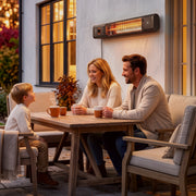 Black patio heater wall-mounted above a family seated at an outdoor dining table