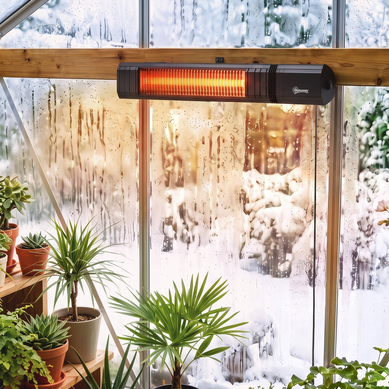 Black wall-mounted patio heater fitted in a snowy greenhouse among plants