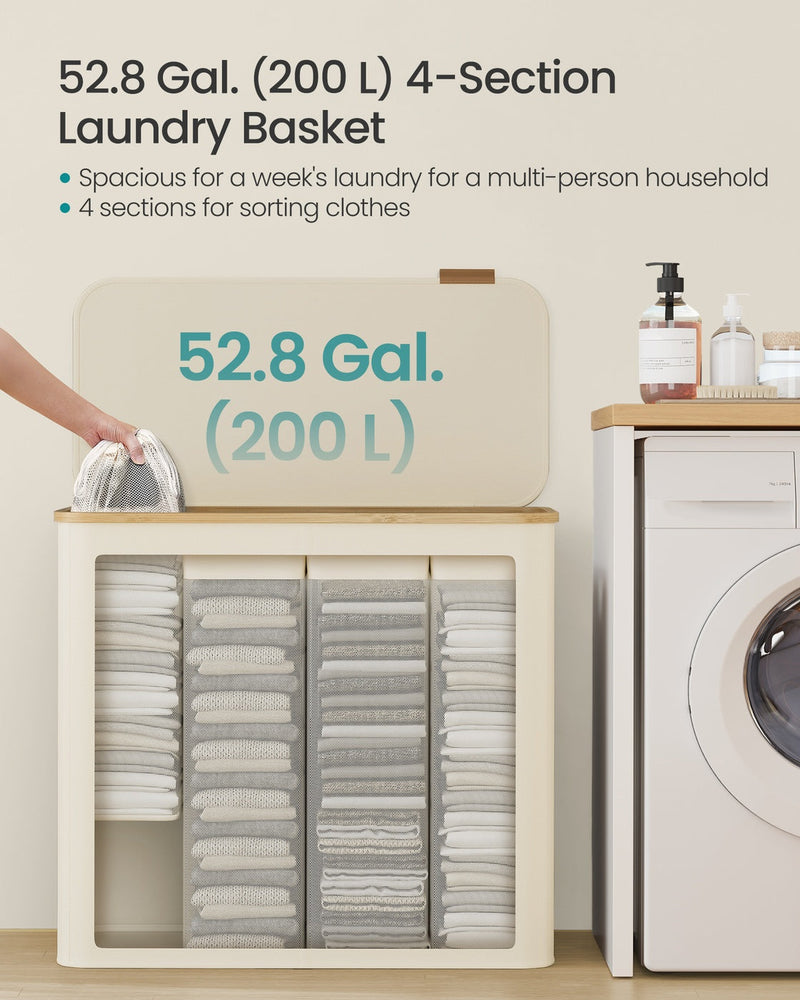 The 200 L laundry basket open to show 4 sections of folded washing beside a washing machine