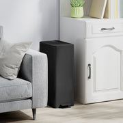 Black 20L slim stainless steel pedal bin closed beside a grey sofa and white cabinet from a second angle
