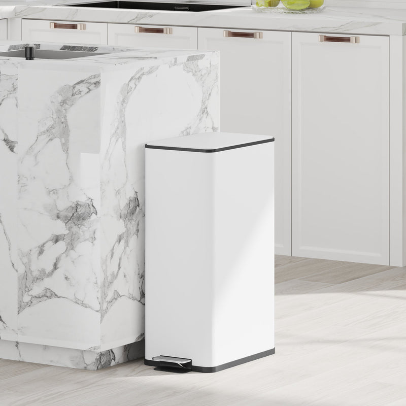 White 20L slim stainless steel pedal bin in a marble-topped kitchen island setting