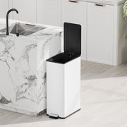 White 20L slim stainless steel pedal bin with the lid open beside a kitchen island
