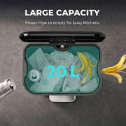 Top view of the 20L pedal bin showing the large opening filled with rubbish