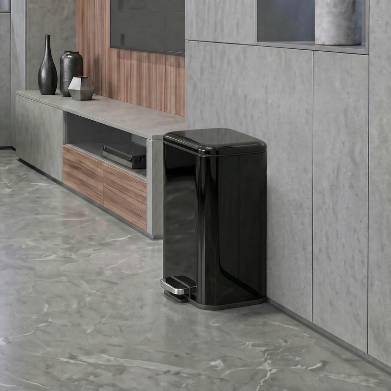 20L pedal bin standing beside a TV unit in a living room
