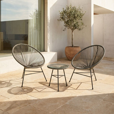 Grey rattan 3 piece bistro set styled on a patio