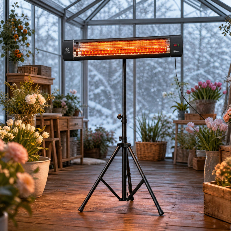 Patio heater warming a glass conservatory filled with plants in the snow