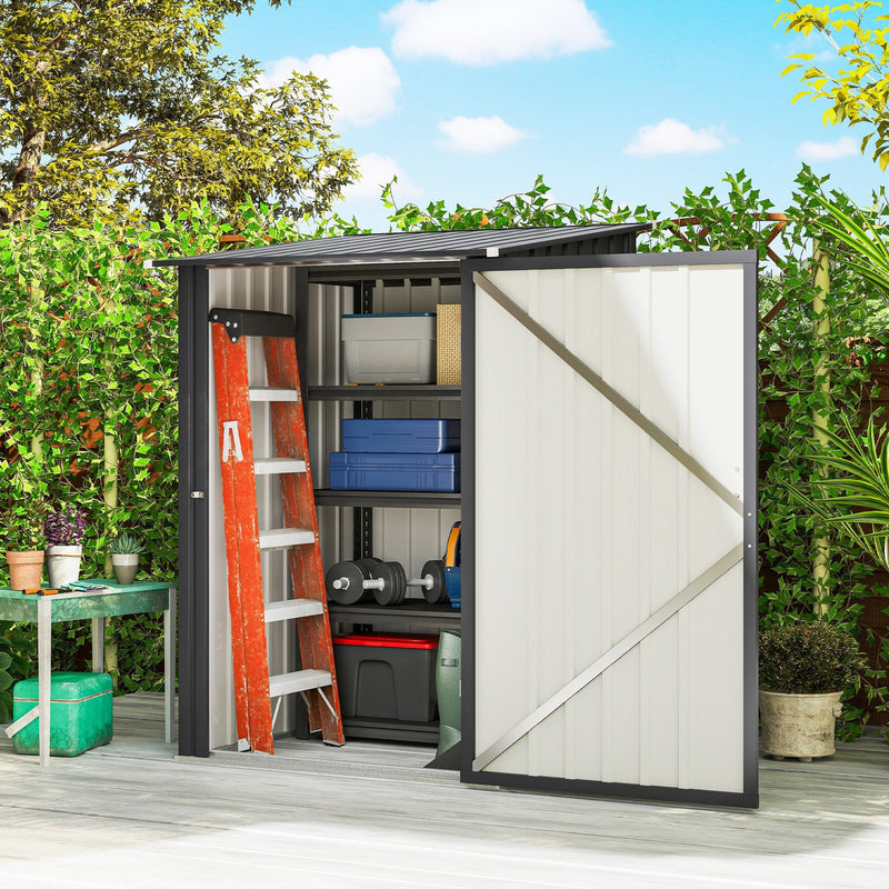 Shed door open on a garden deck showing a ladder, tools and storage boxes inside