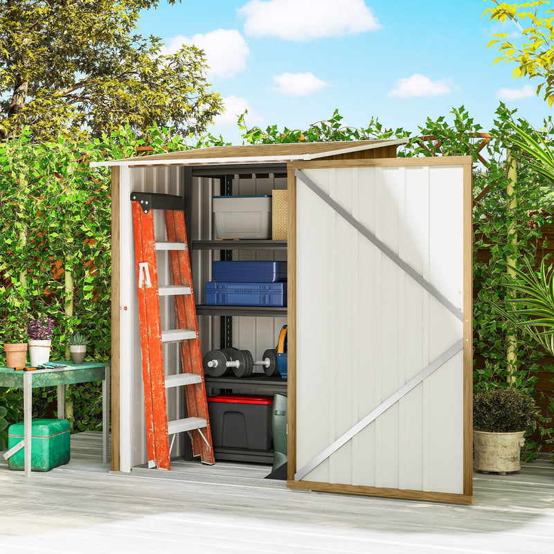 Shed door open showing a stepladder, storage boxes and weights stored inside on wooden decking