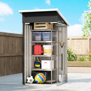 Metal shed with shelving holding boxes, a bucket and sports balls