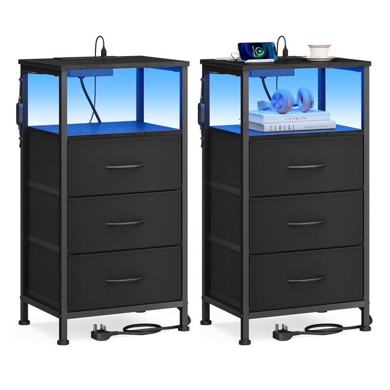 Two ink black bedside tables with three fabric drawers each and blue LED lit open shelves