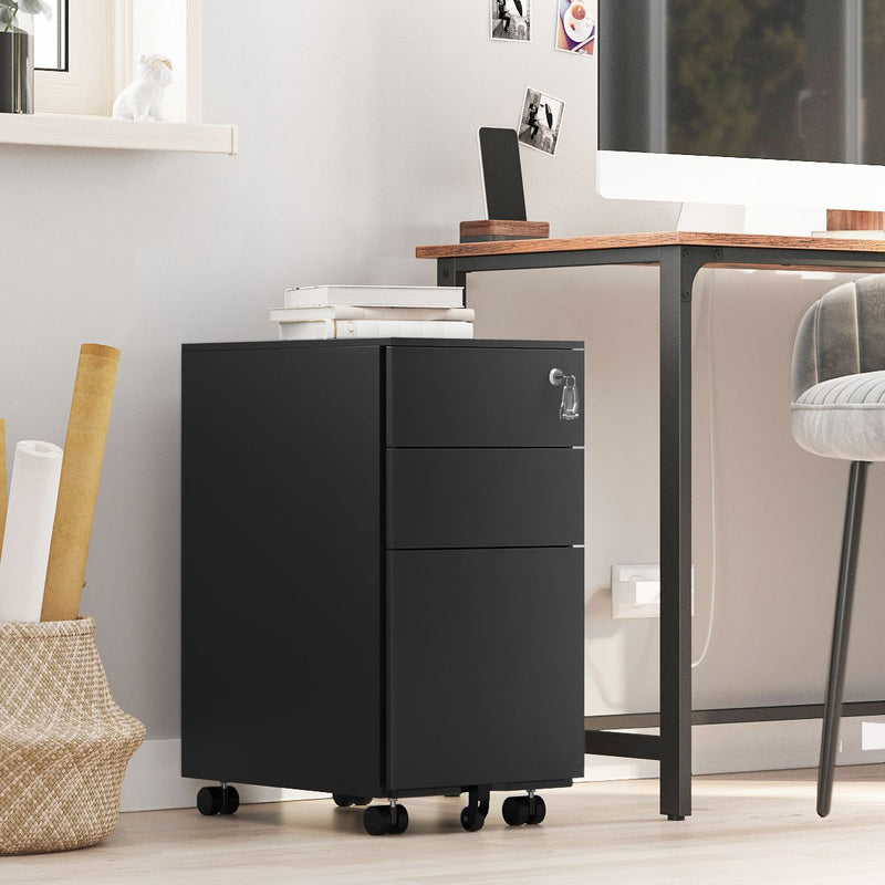 Black file cabinet on castors beside a home office desk in a bright room