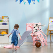 Toddler walking toward the pink tiger-themed slide and basketball hoop in a playroom