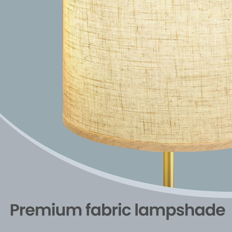 Close-up of the fabric lampshade texture and gold pole connector