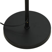 Close-up of the round black weighted base and power cable