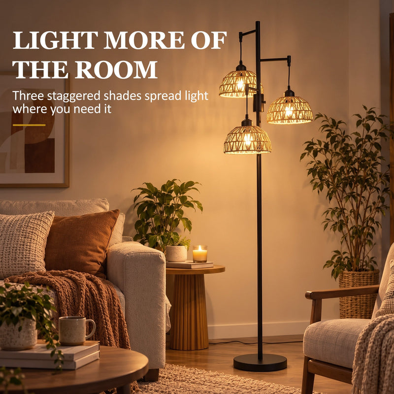 Three staggered woven shades lighting a living room corner