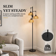 Slim floor lamp beside an armchair with a 2.8 kg weighted base callout