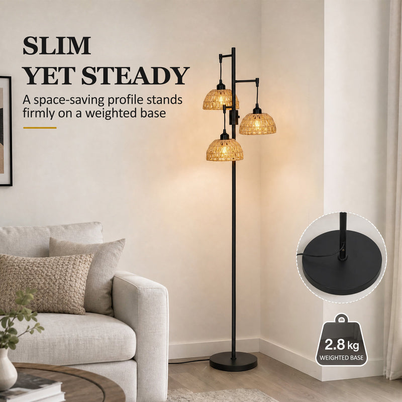 Slim floor lamp beside an armchair with a 2.8 kg weighted base callout