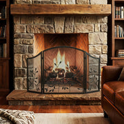 Fireplace screen in front of a stone fireplace with a rustic timber mantel